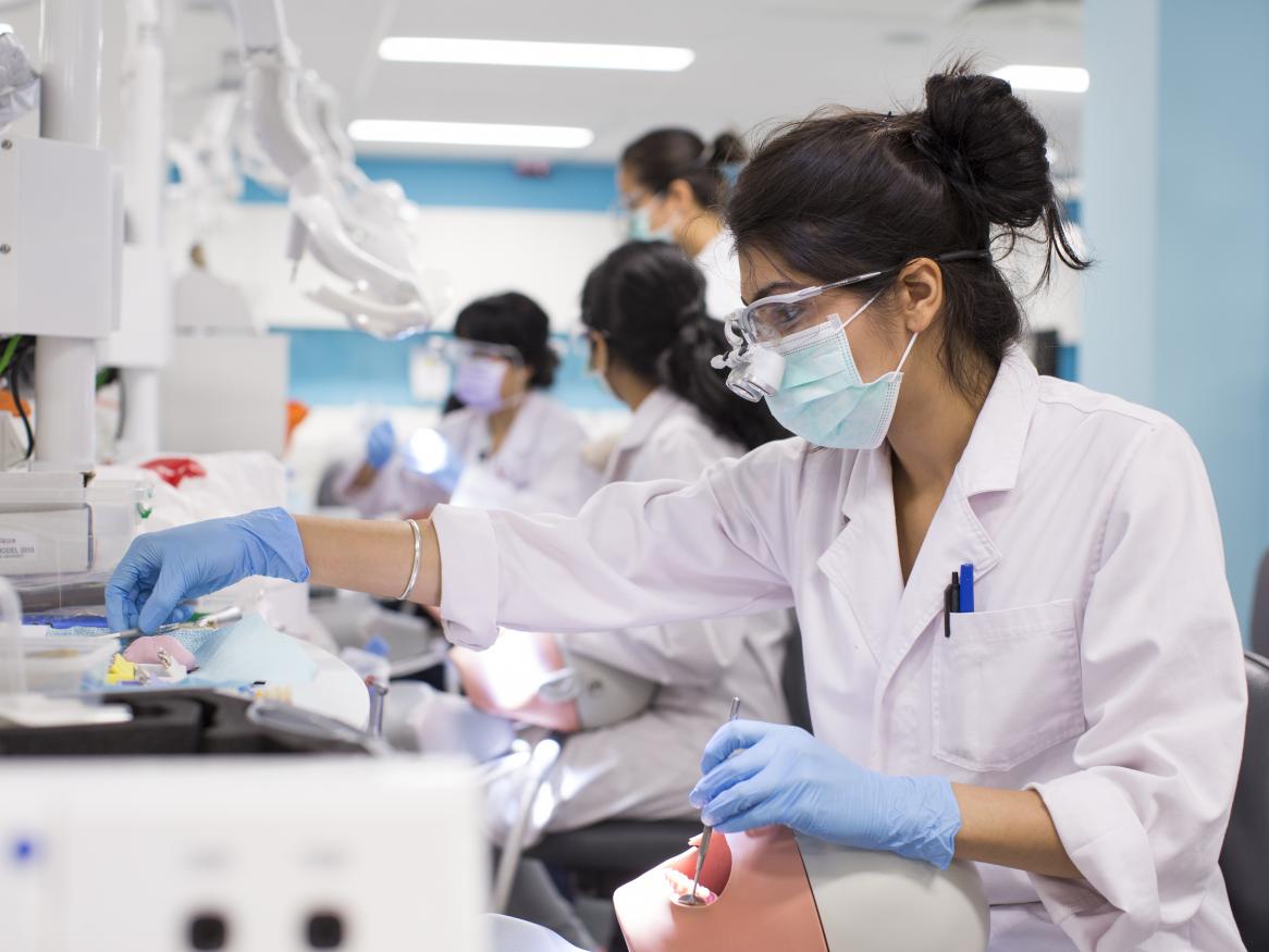Researchers in lab coats