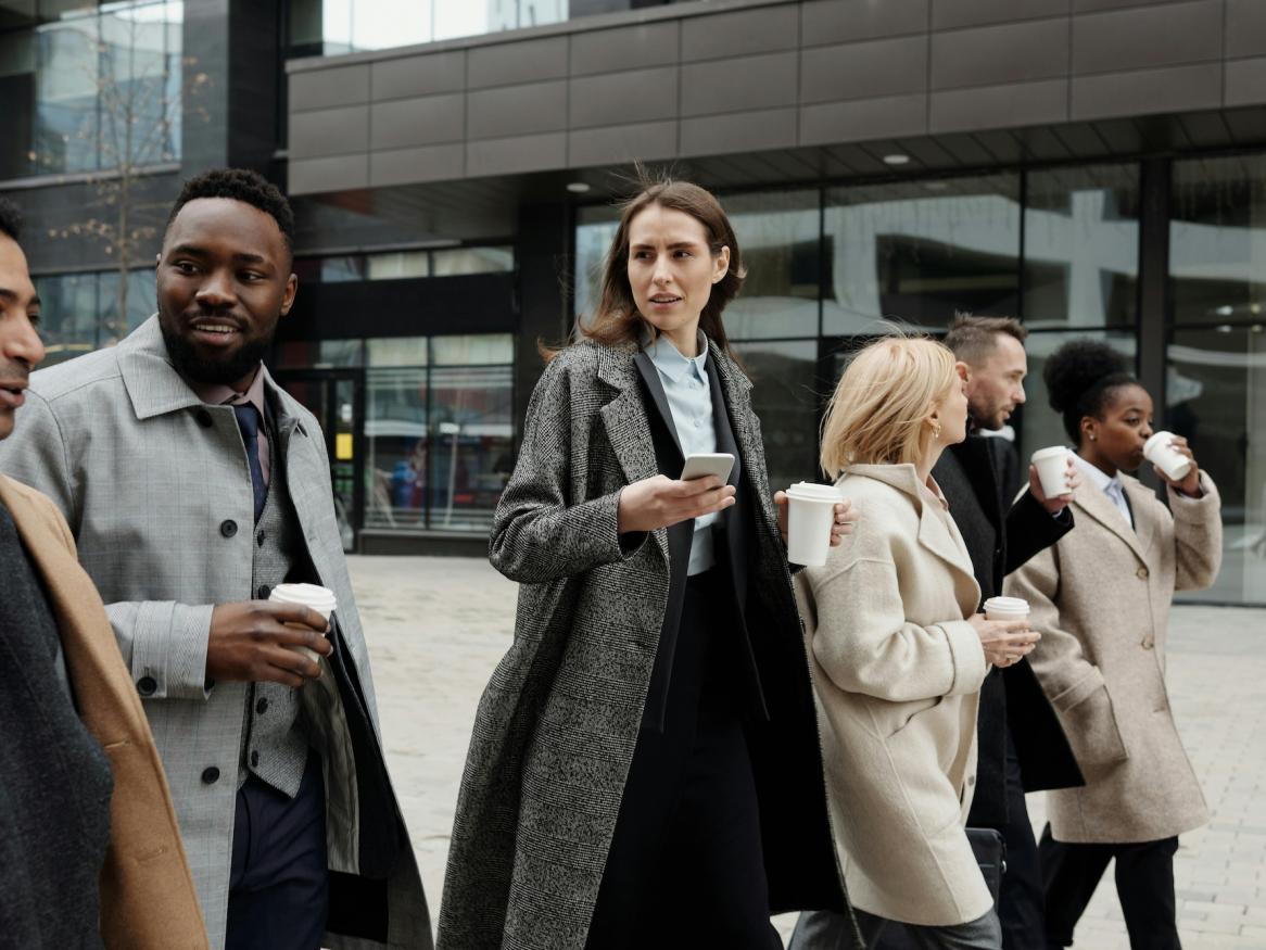 Group of colleagues walking outdoors