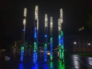 Kaurna poles lit up at night